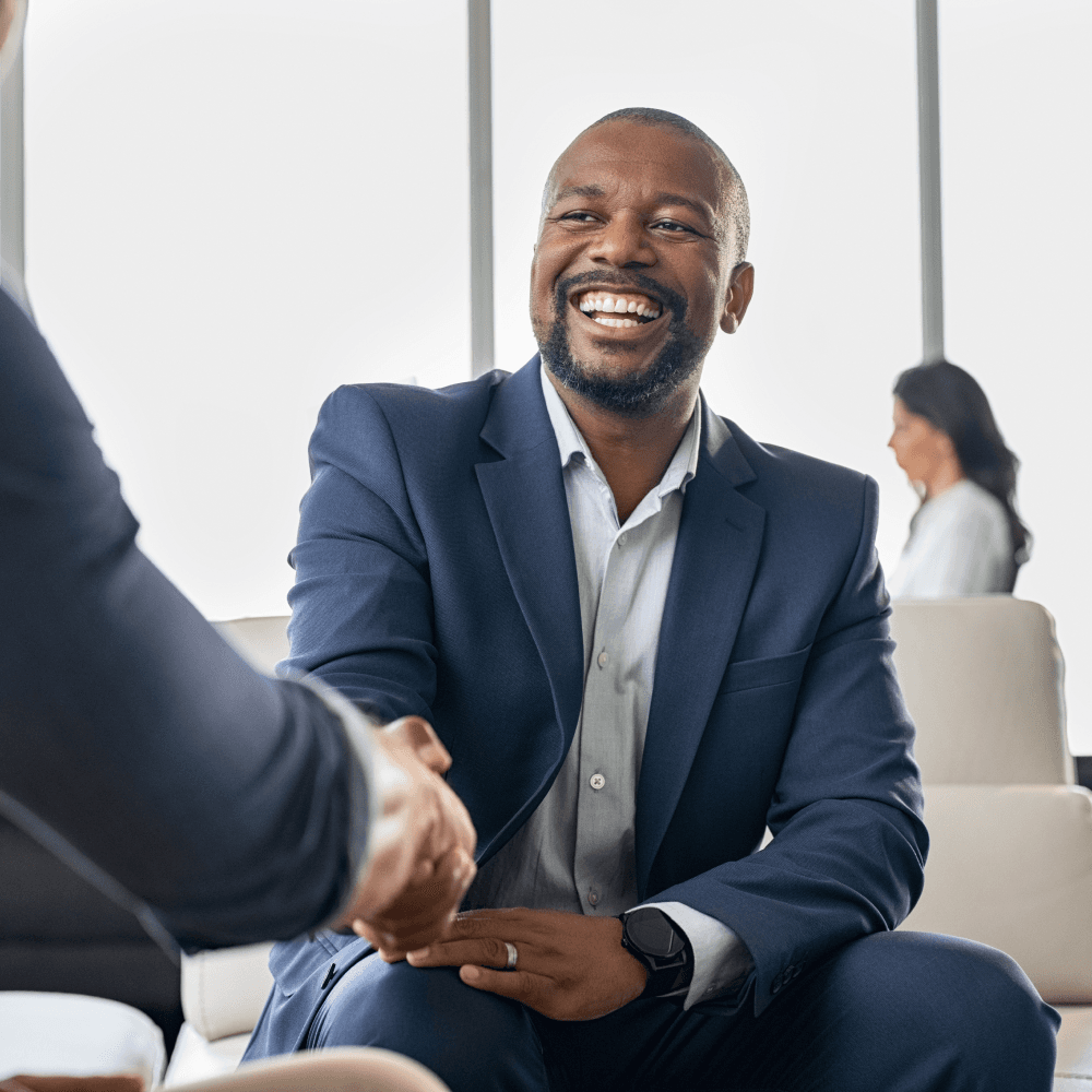 Happy man shaking hands